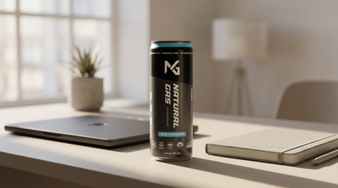Natural Gas Blue Raspberry organic energy drink can on a desk